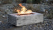 Natural timber look GFRC propane fire feature